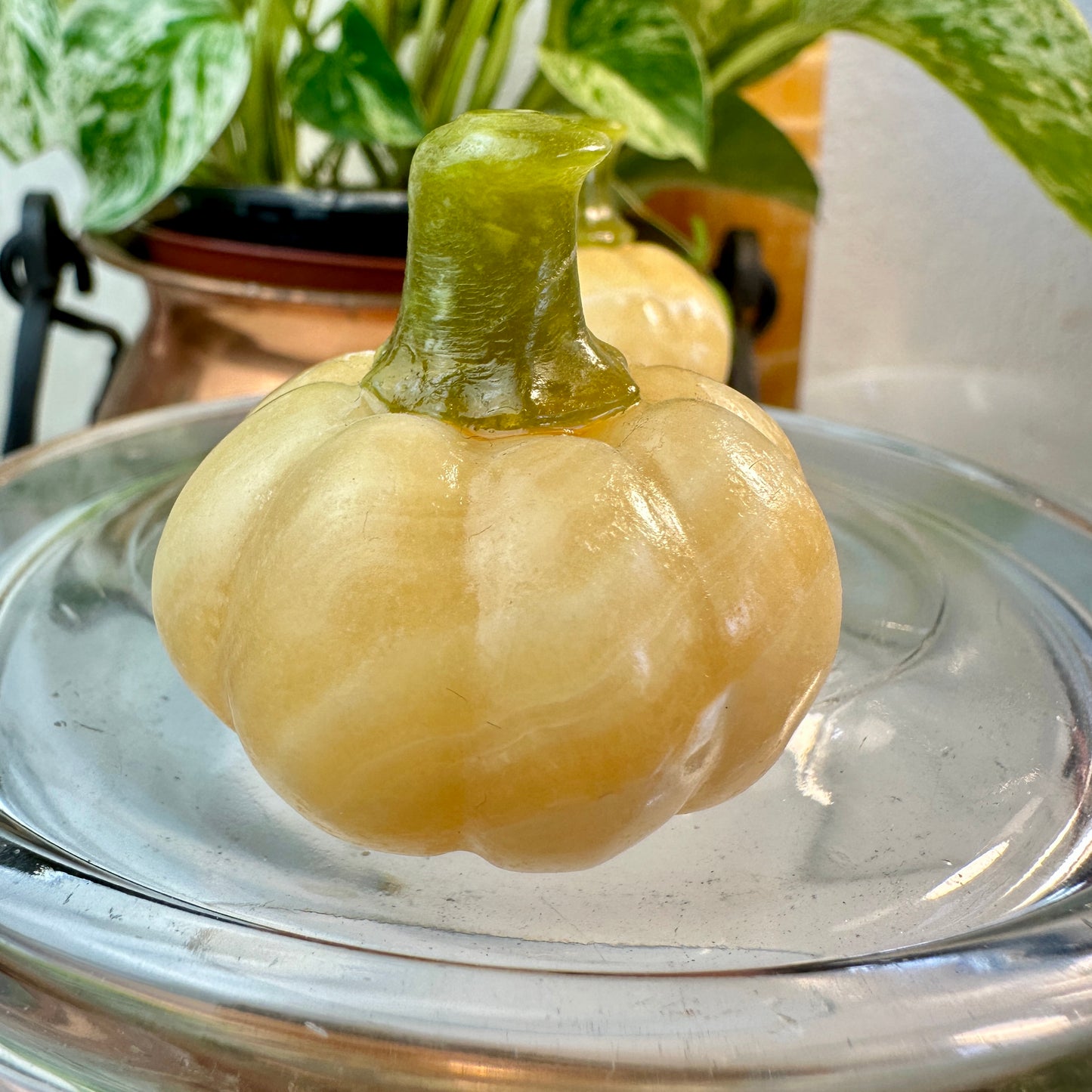 Banded Calcite Pumpkin with Serpentine Stem — 1.5 Inches Tall
Joy • Transformation • Earth Energy