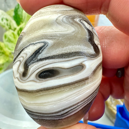 Panda Calcite Palm Stone