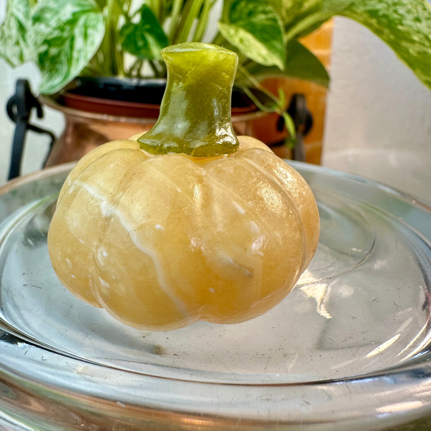 Banded Calcite Pumpkin with Serpentine Stem — 1.5 Inches Tall
Joy • Transformation • Earth Energy