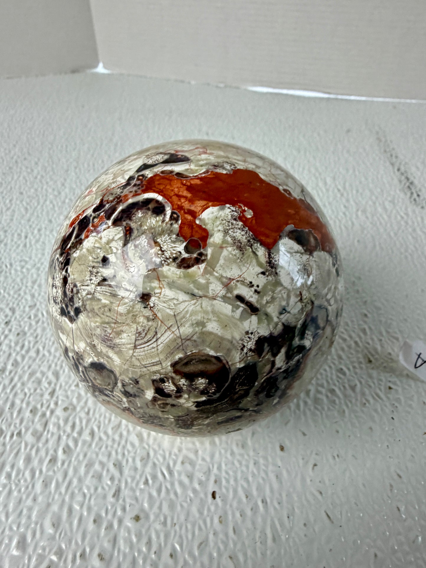 Banded Money Agate Sphere (582g) – Concentric Bullseye Pattern & Fiery Red Agate Banding