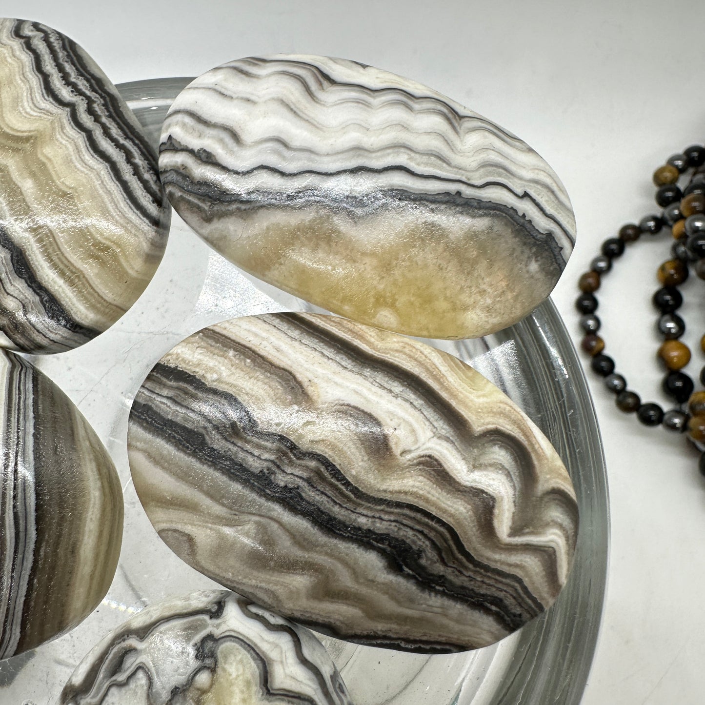 Panda Calcite Palm Stone